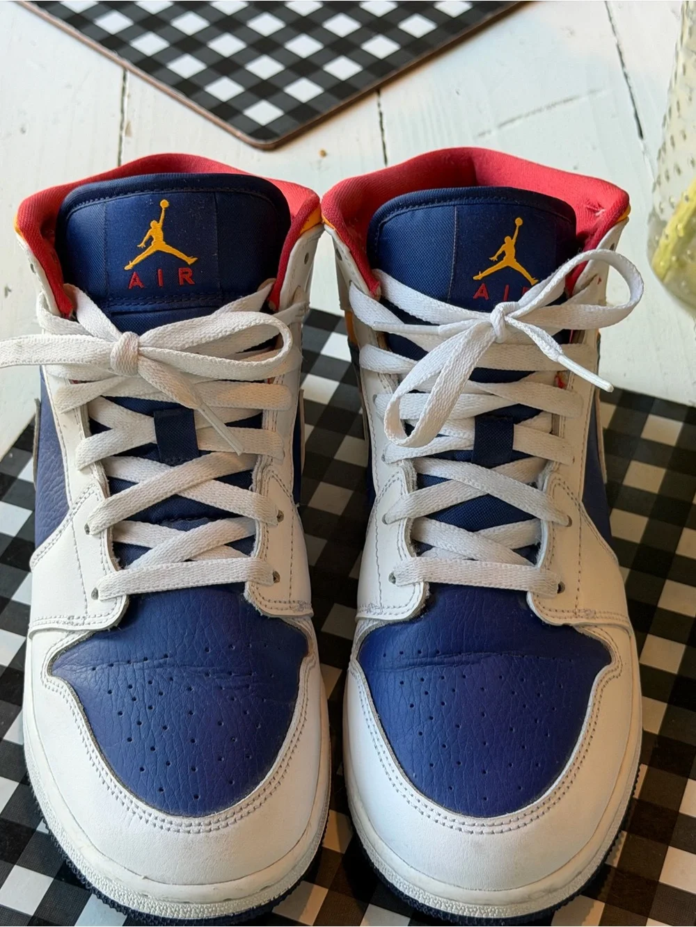 Jordan 1 Mid Top Sneakers in Navy, White & Red